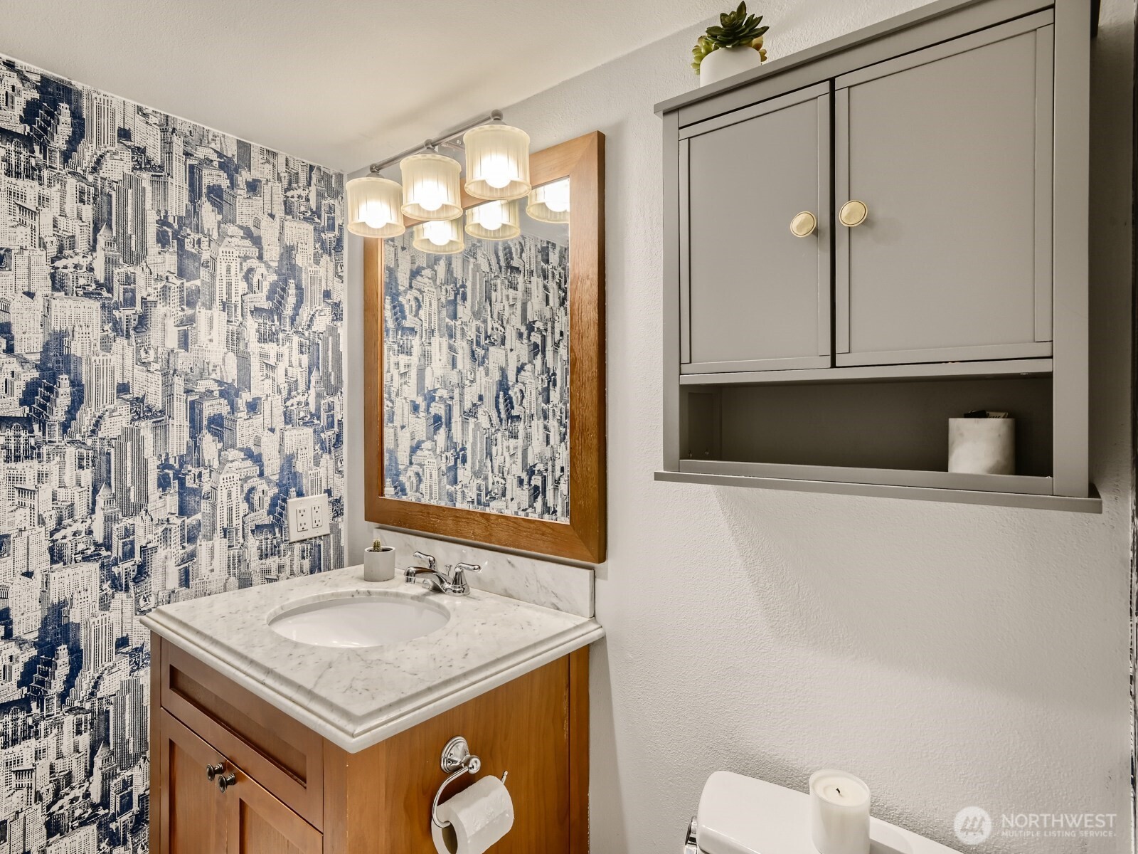 201 Galer Street, Unit 163 Seattle, WA 98109 - Photo 13 of 26 a bathroom with a sink a toilet and shower