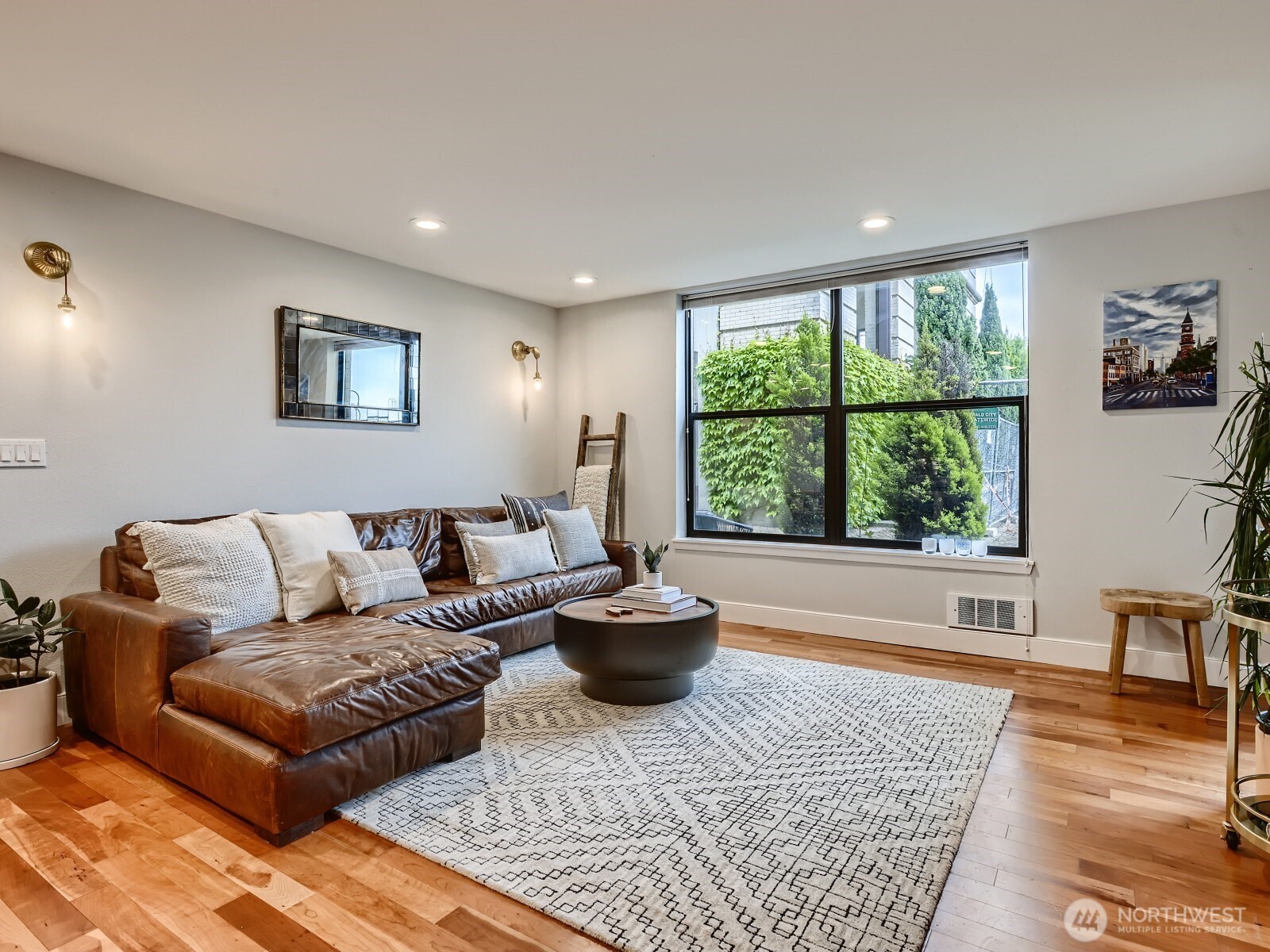 201 Galer Street, Unit 163 Seattle, WA 98109 - Photo 7 of 26 a living room with furniture and a large window