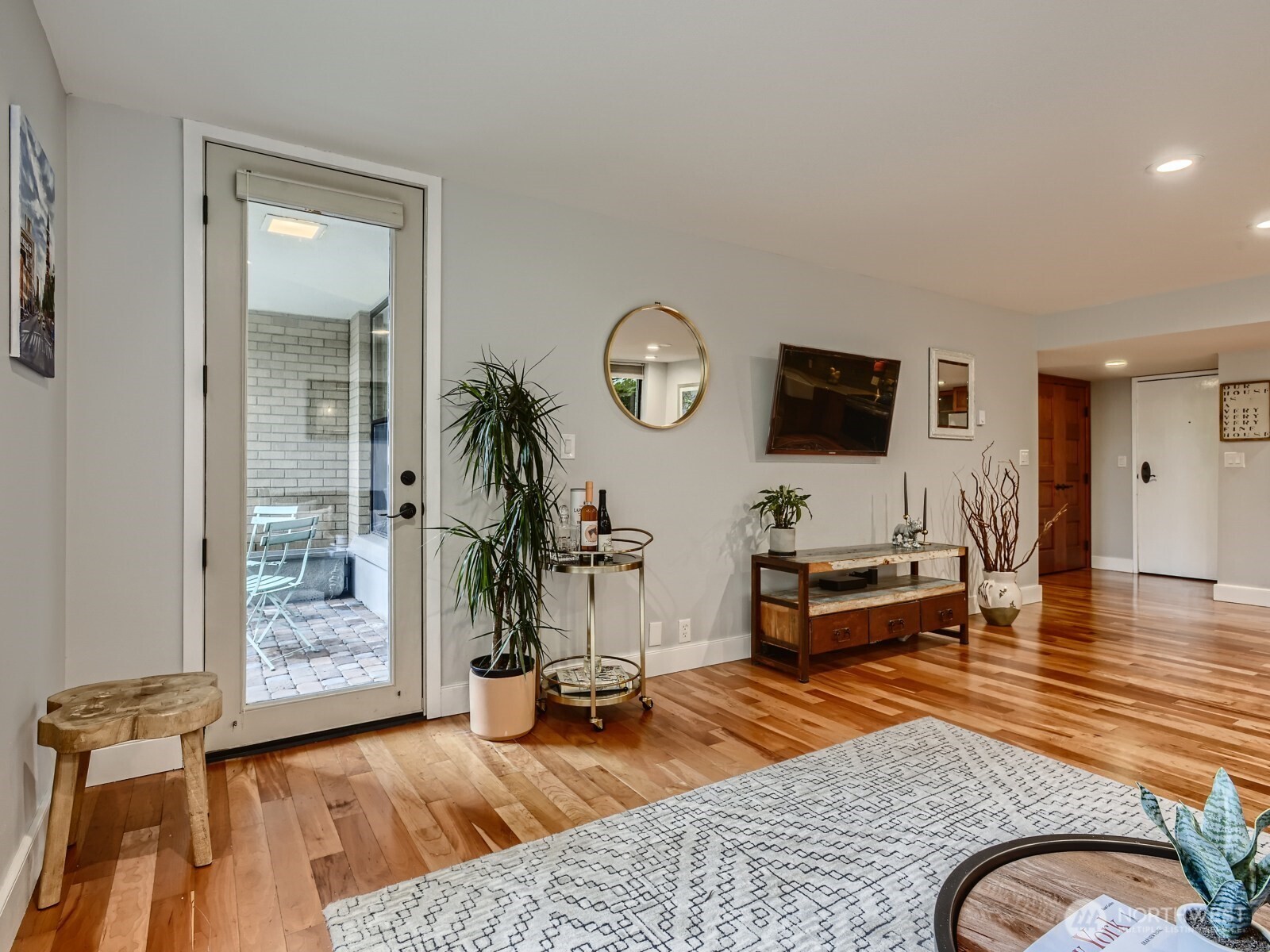 201 Galer Street, Unit 163 Seattle, WA 98109 - Photo 9 of 26 a living room with furniture and wooden floor