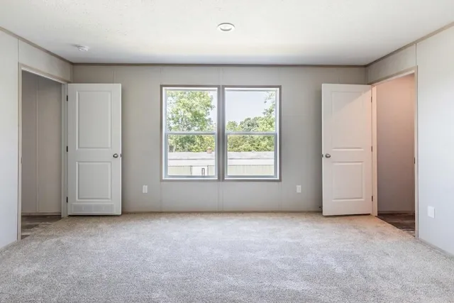 an empty room with windows