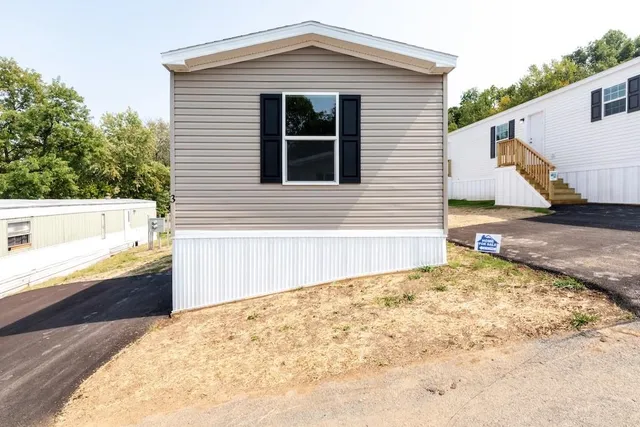 a view of a backyard of the house
