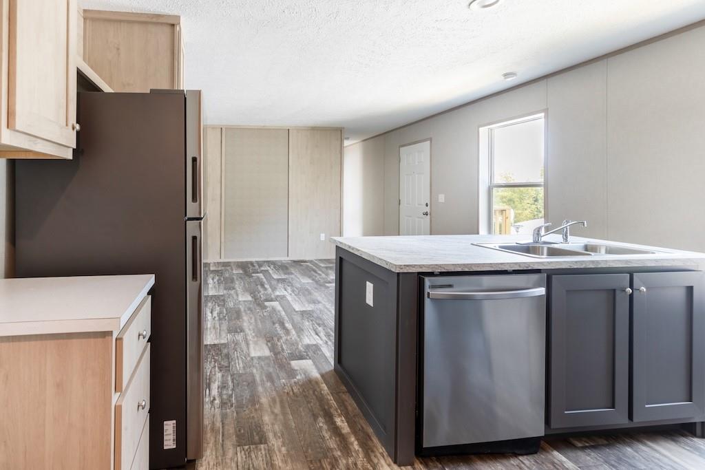 321 Beallsville Road Bentleyville, PA 15314 - Photo 6 of 27 a kitchen with a sink and a refrigerator