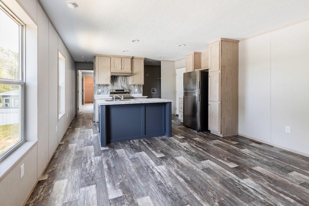321 Beallsville Road Bentleyville, PA 15314 - Photo 8 of 27 a kitchen with stainless steel appliances granite countertop a refrigerator and a stove top oven