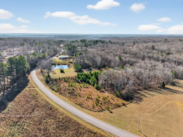 a view of a yard with an ocean view