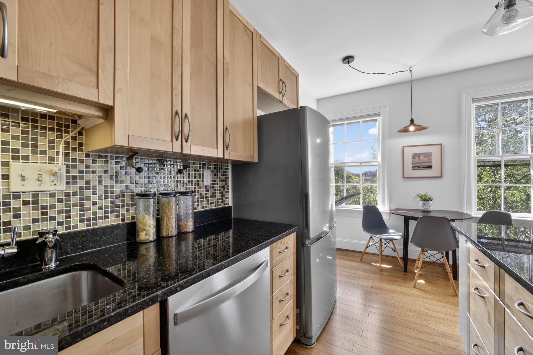 2707 Adams Mill Road Northwest, Unit 400 Washington, DC 20009 - Photo 12 of 21 Charming kitchen with modern touches.