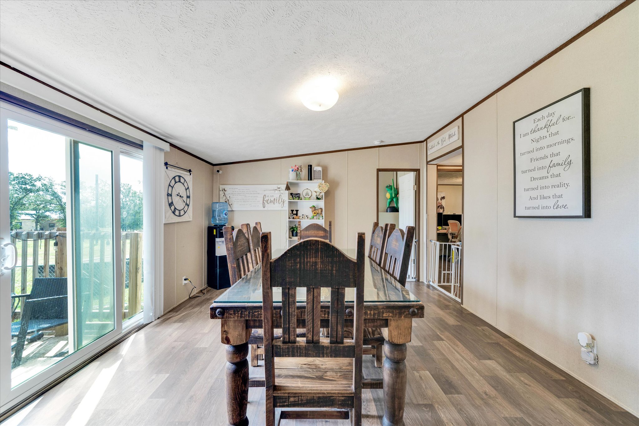 2755 Washburn Road Luling, TX 78648 - Photo 12 of 40 Natural light floods this dining area through expansive sliding glass doors leading to a private deck.