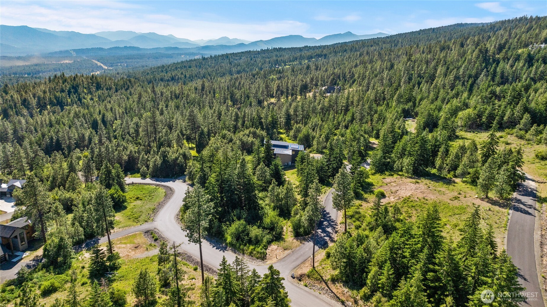 29 Frst Rdg Drive Cle Elum, WA 98922 - Photo 19 of 26 a view of a city with lush green forest