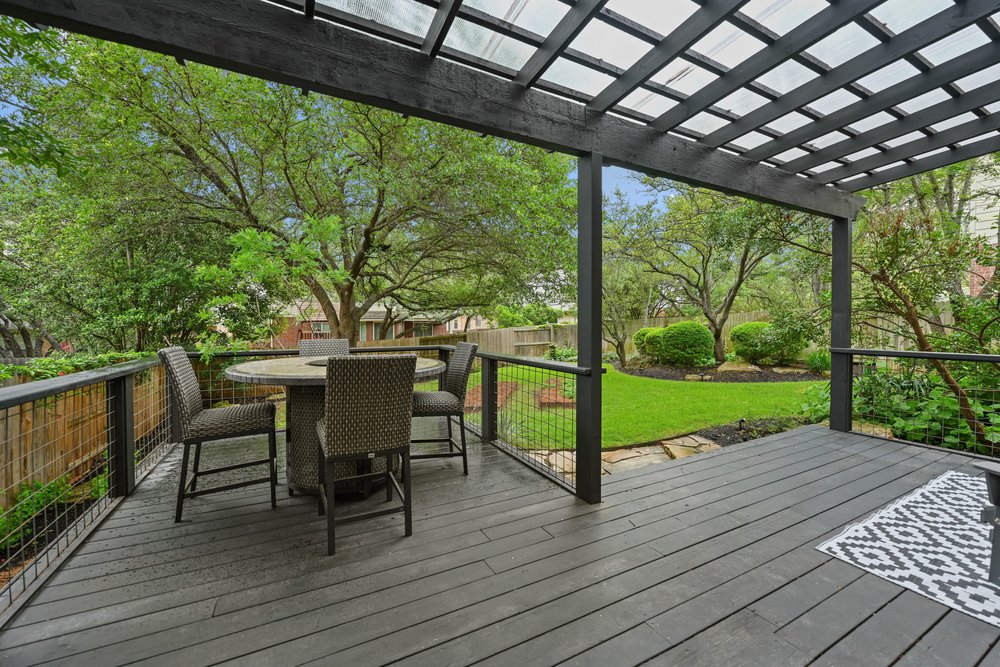 2823 Lantana Ridge Drive Austin, TX 78732 - Photo 30 of 34 a view of a table and chairs on the roof deck