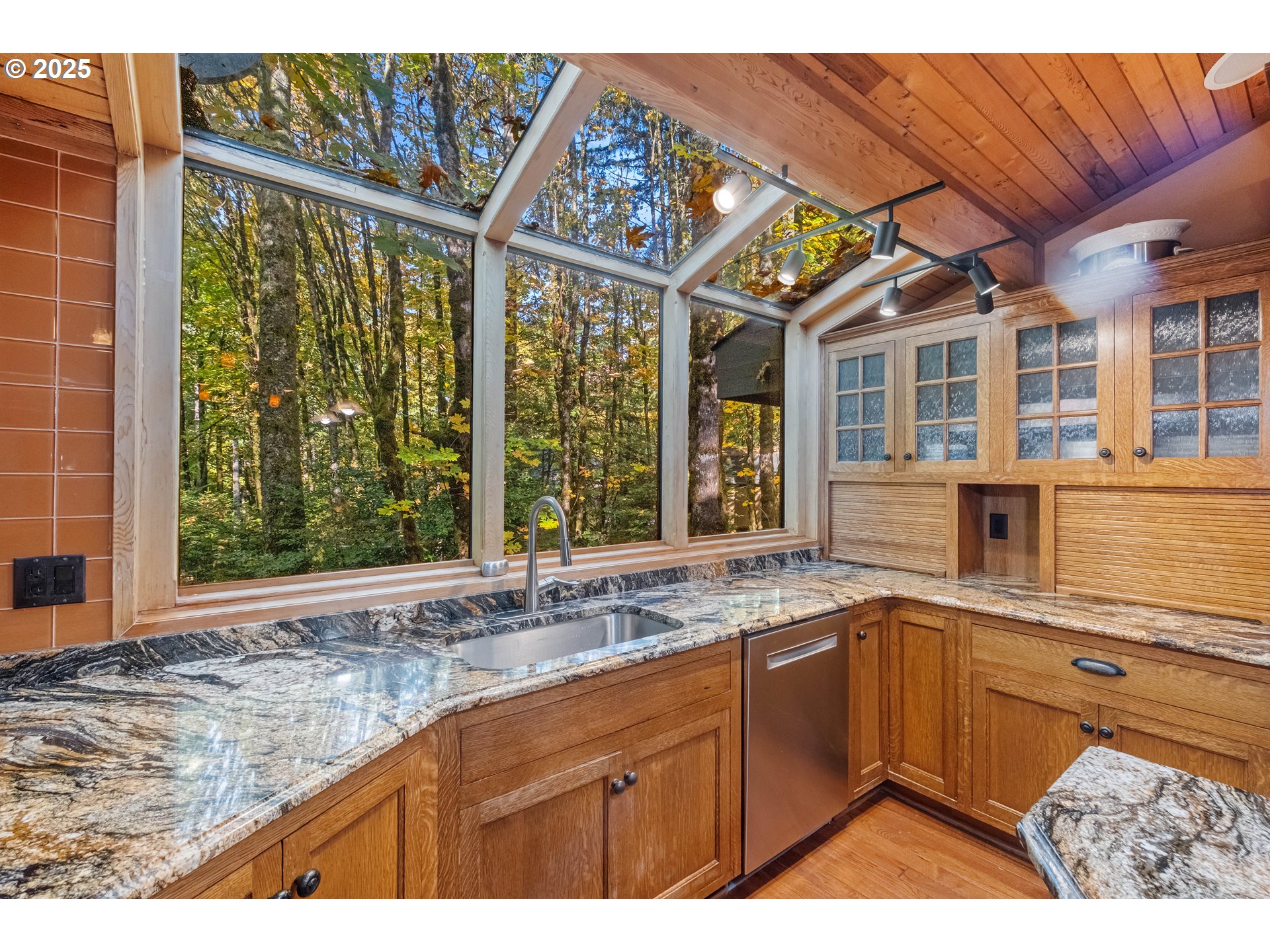 6894 Prospect Ridge Road South Salem, OR 97306 - Photo 11 of 48 a kitchen with a sink and large windows