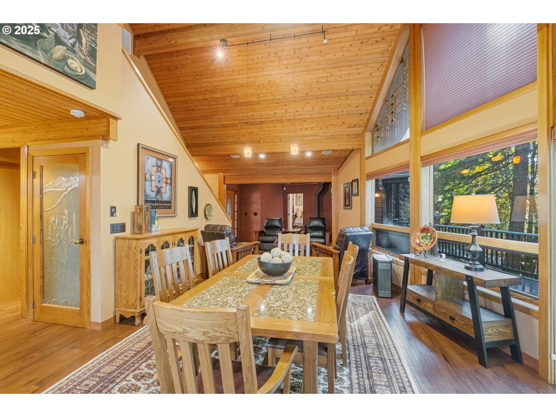 6894 Prospect Ridge Road South Salem, OR 97306 - Photo 32 of 48 a view of a dining room with furniture window and wooden floor