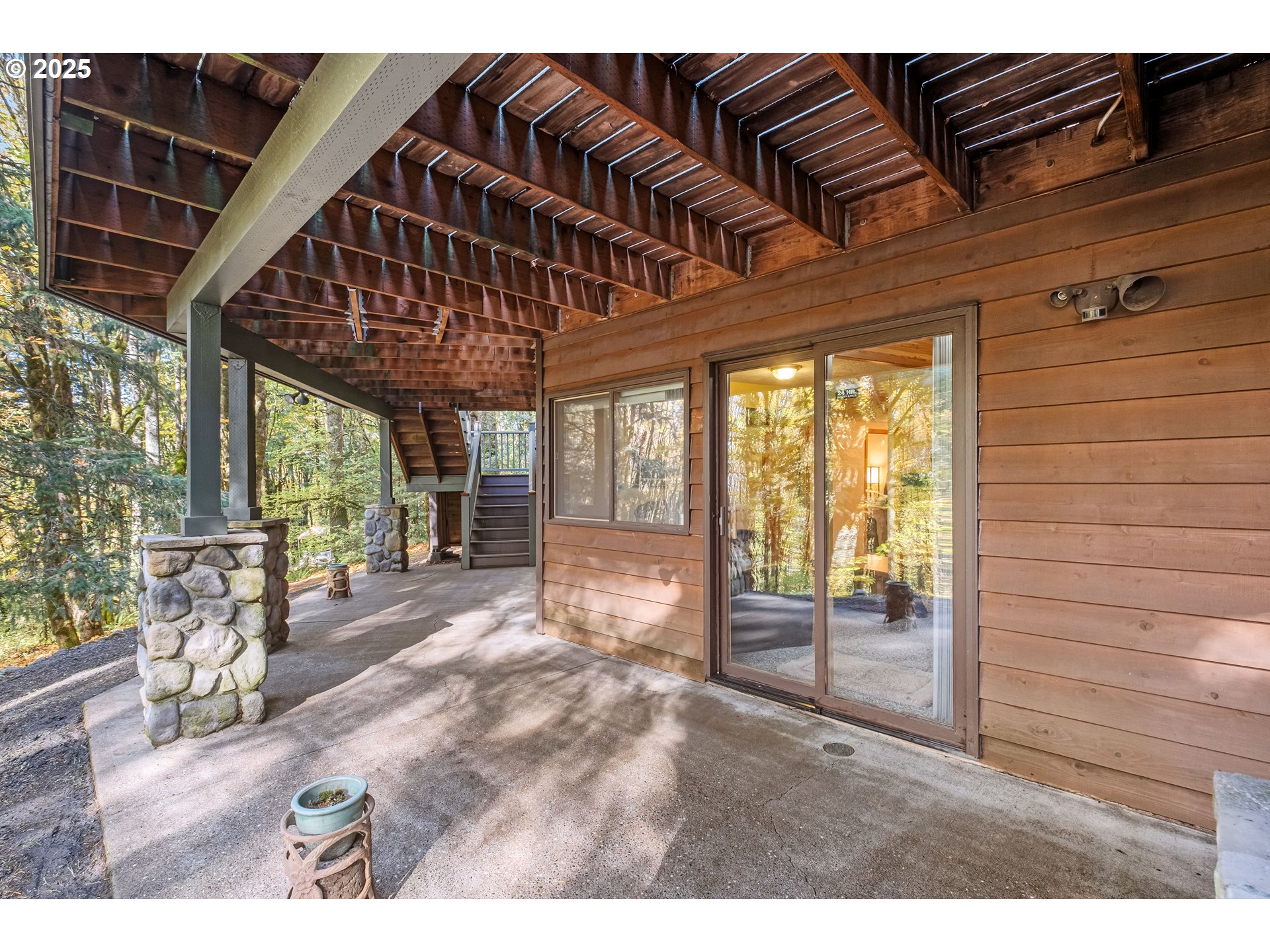 6894 Prospect Ridge Road South Salem, OR 97306 - Photo 40 of 48 a view of a porch with furniture and floor to ceiling window