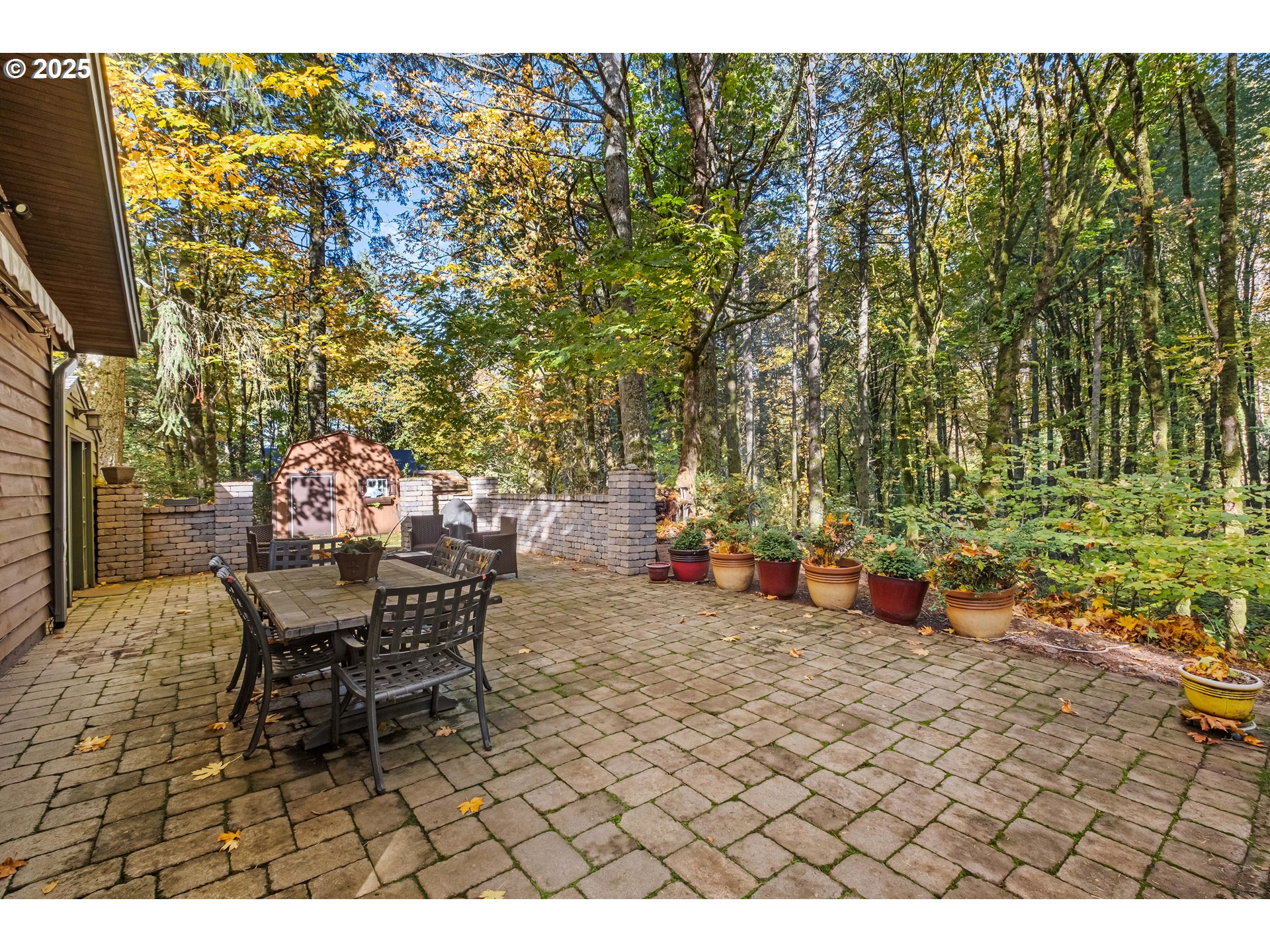 6894 Prospect Ridge Road South Salem, OR 97306 - Photo 43 of 48 a view of a patio with table and chairs and potted plants