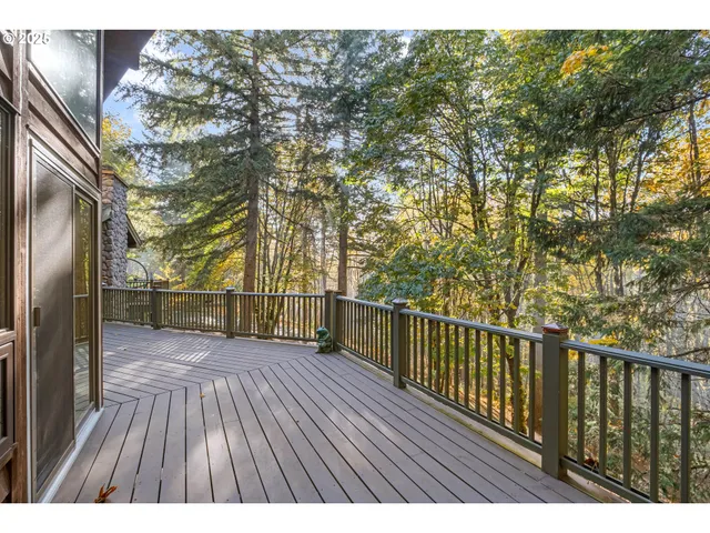 a view of balcony with wooden floor