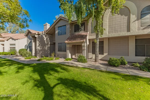 a view of a house with swimming pool