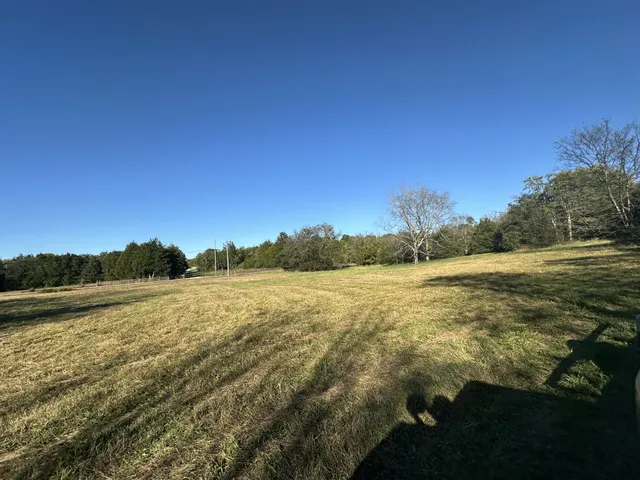 a view of an ocean from a mountain