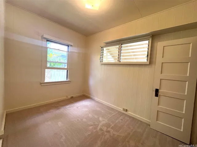 a view of a house with a garage and a sink