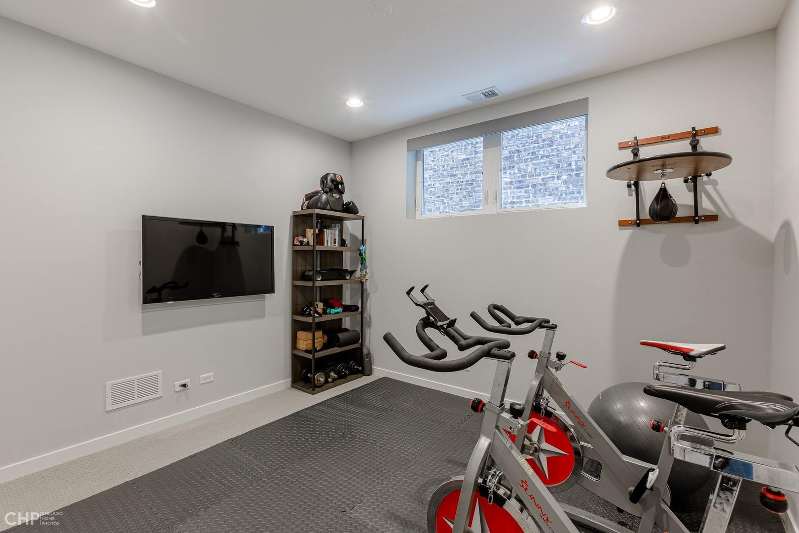 1033 South Racine Avenue, Unit 1S Chicago, IL 60607 - Photo 25 of 32 a view of a room with gym equipment