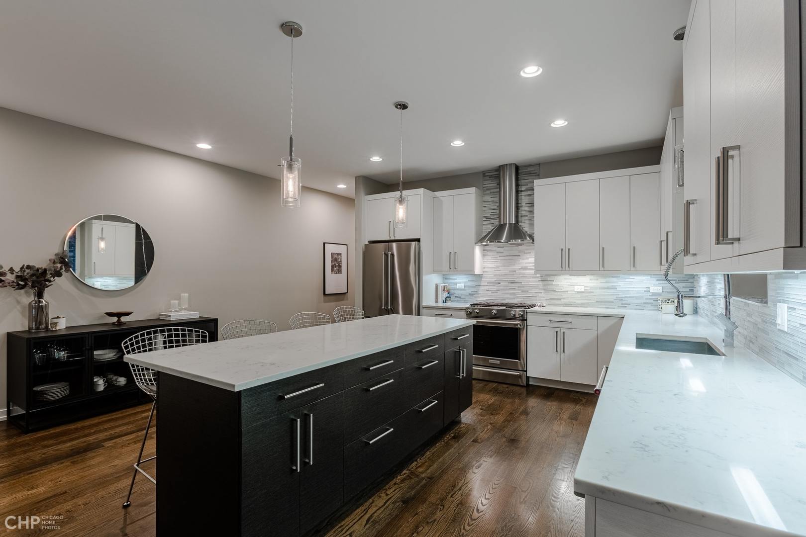 1033 South Racine Avenue, Unit 1S Chicago, IL 60607 - Photo 9 of 32 a large kitchen with cabinets