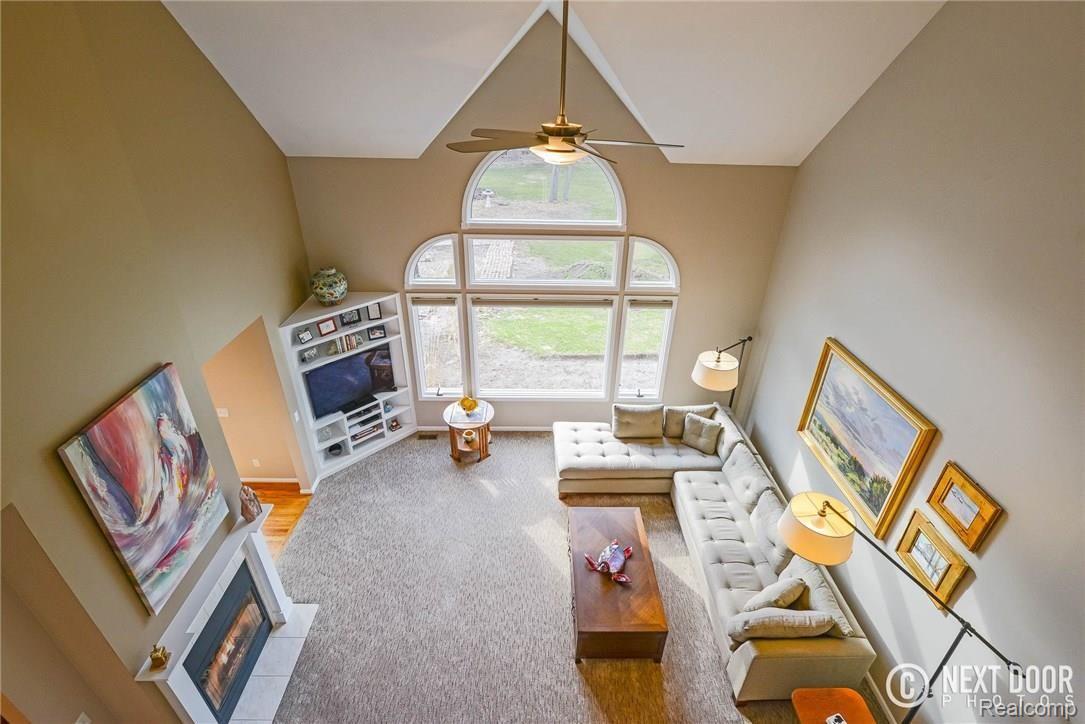 4886 Pleasant Valley Road Brighton, MI 48114 - Photo 16 of 51 Wow, this is why they call it a great room!