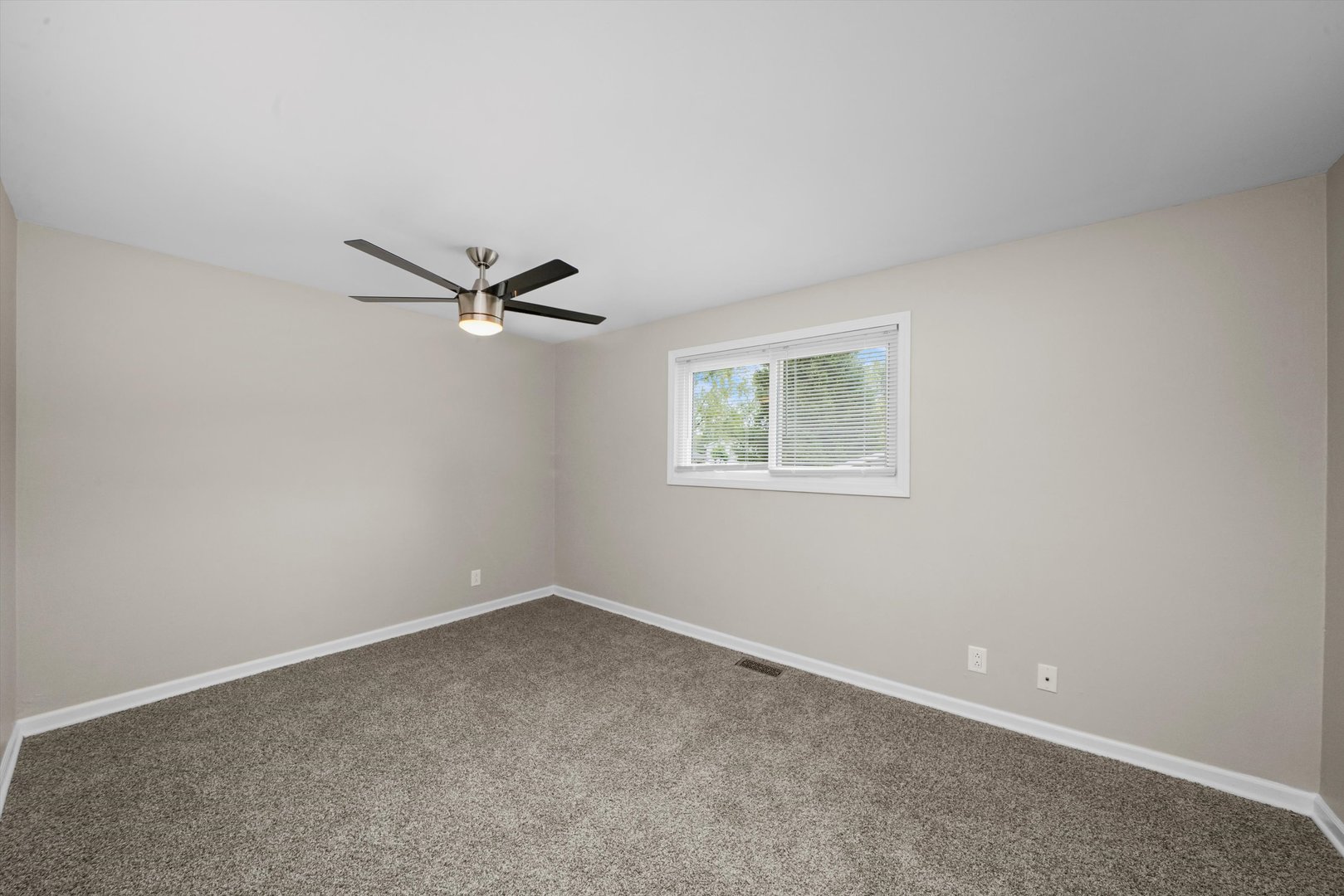 300 Hadleigh Road Bolingbrook, IL 60440 - Photo 16 of 45 an empty room with a window