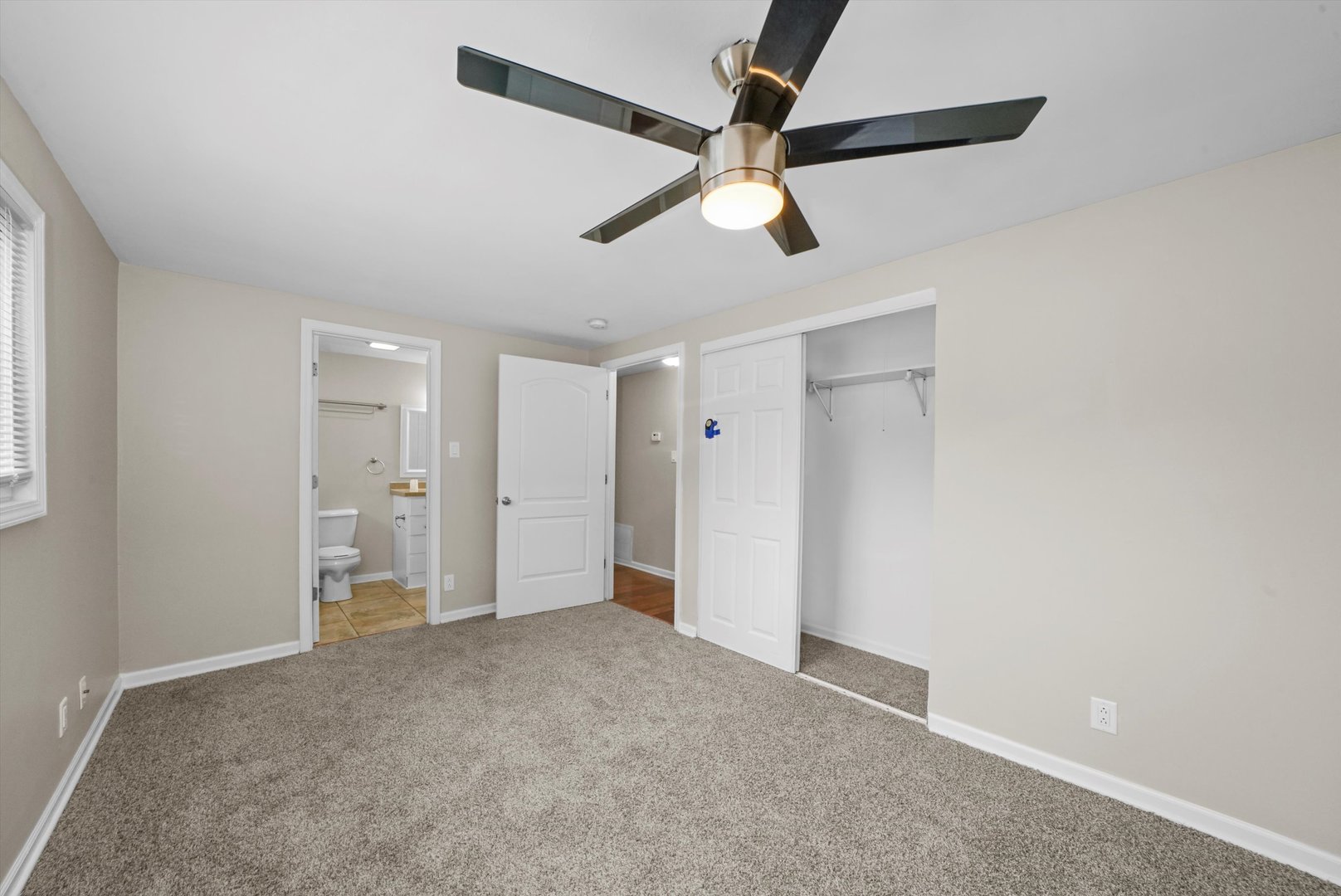 300 Hadleigh Road Bolingbrook, IL 60440 - Photo 18 of 45 a view of a big room with wooden floor and windows in a room