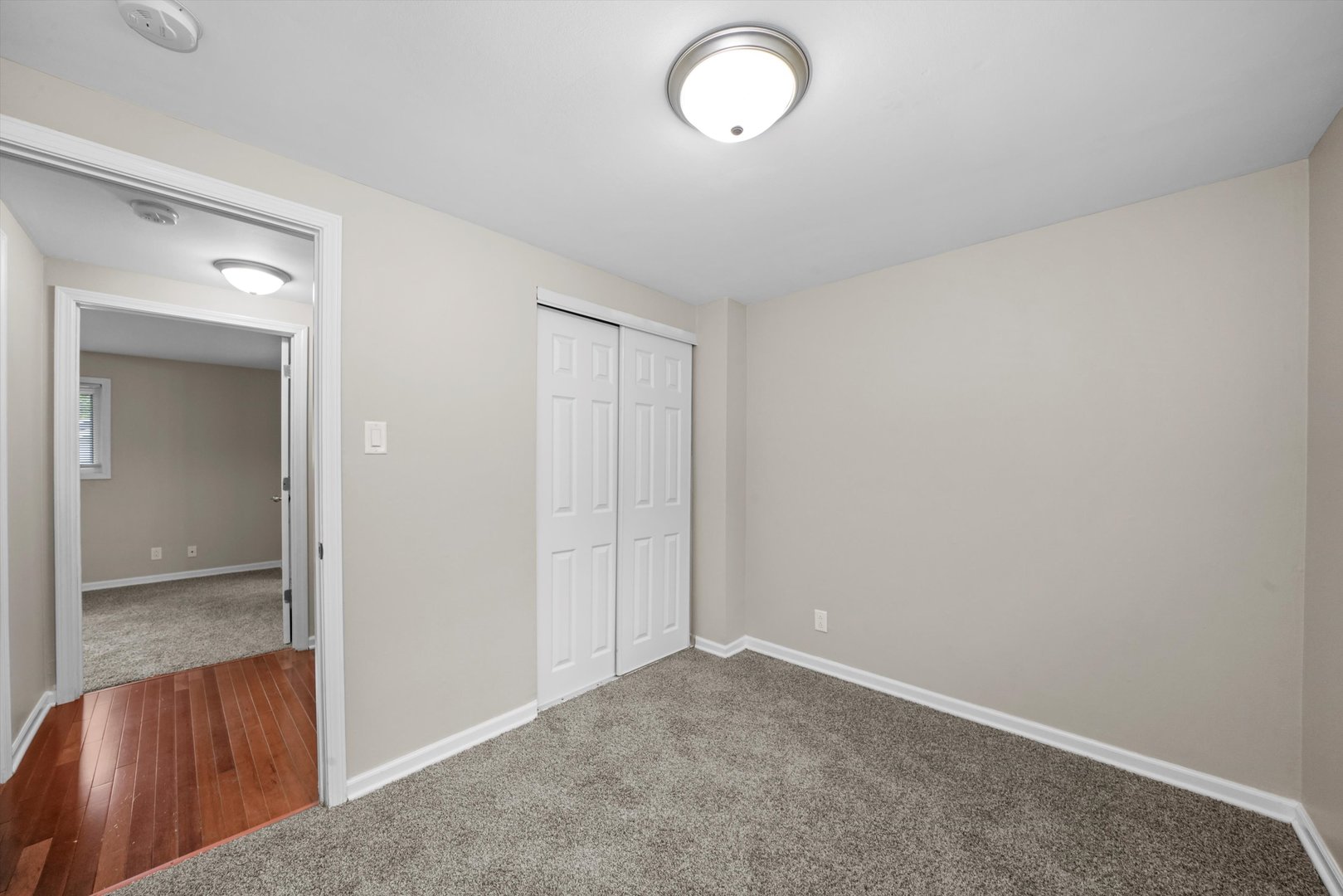 300 Hadleigh Road Bolingbrook, IL 60440 - Photo 23 of 45 an empty room with windows
