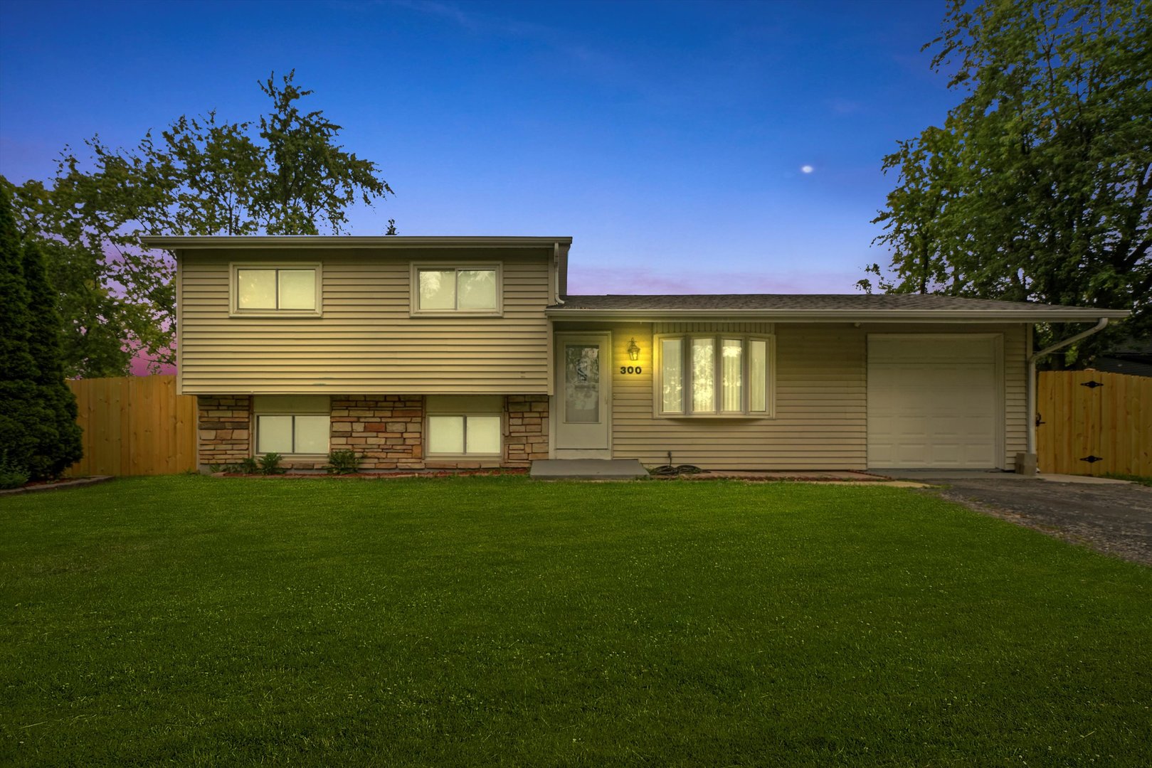 300 Hadleigh Road Bolingbrook, IL 60440 - Photo 3 of 45 a front view of a house with a yard