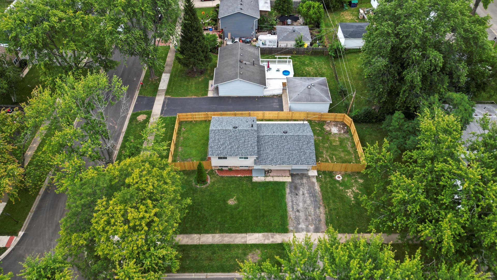 300 Hadleigh Road Bolingbrook, IL 60440 - Photo 41 of 45 an aerial view of a house with a garden