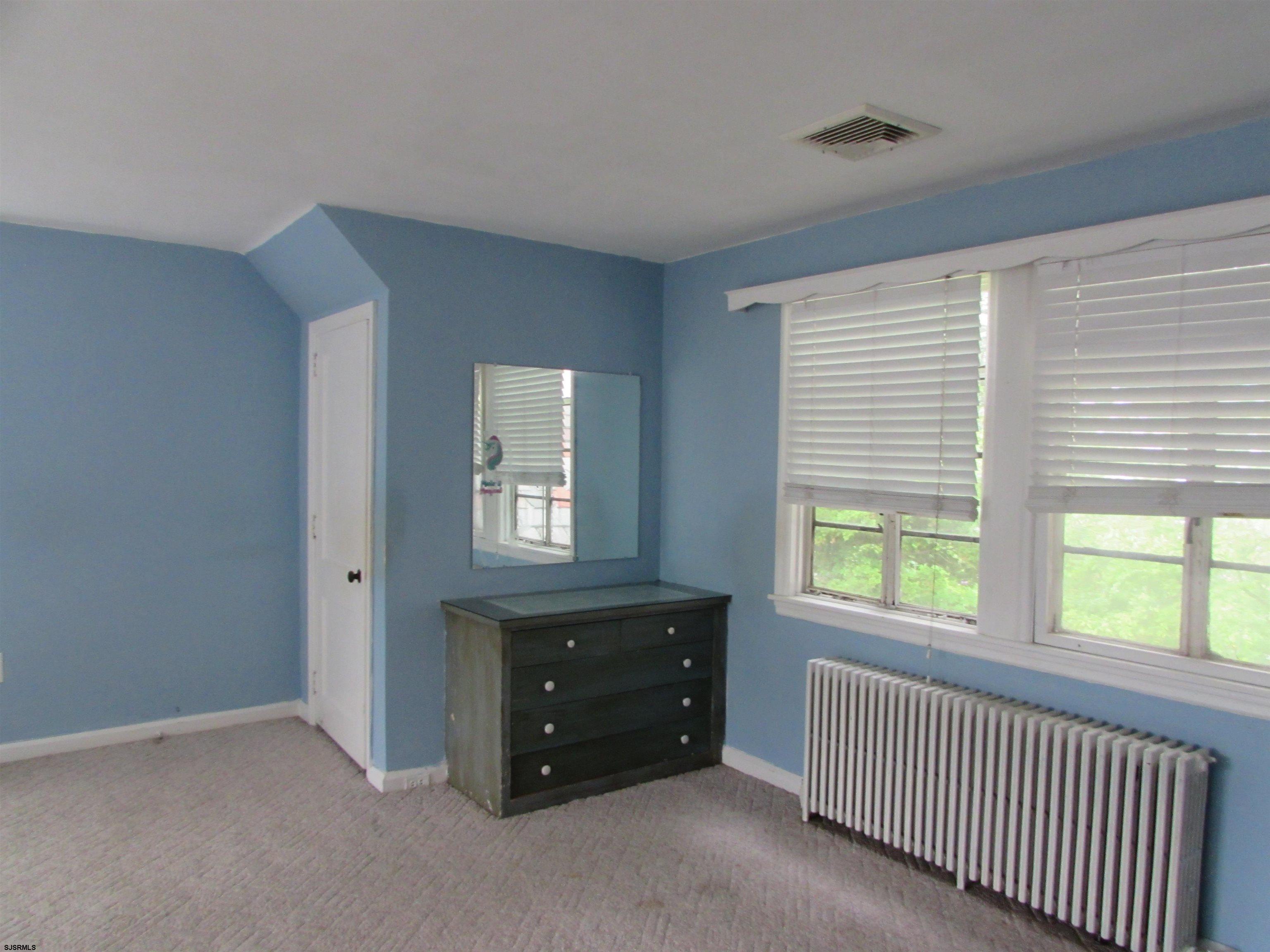 744 Shore Road Linwood, NJ 08221 - Photo 33 of 43 a room with a bed and a window