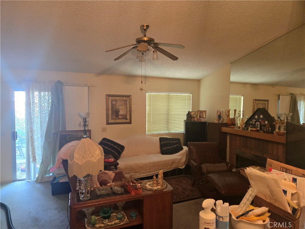 11013 Shaw Street Rancho Cucamonga, CA 91701 - Photo 5 of 12 Living room with fireplace