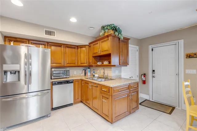 a en suite bathroom with a sink and a mirror
