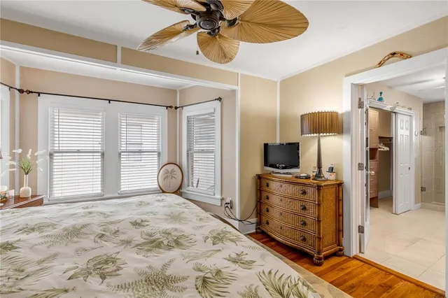 a kitchen with stainless steel appliances a stove a sink a microwave and cabinets
