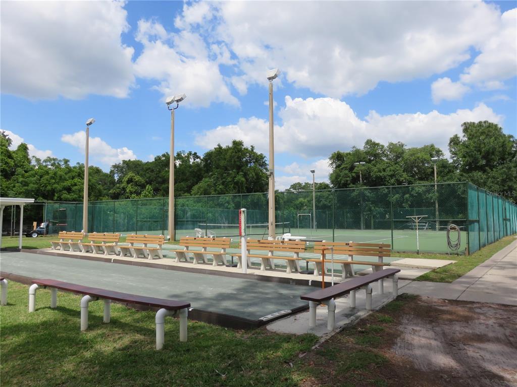 4911 Sunnybrook Drive, Unit 12 New Port Richey, FL 34653 - Photo 27 of 32 a view of a park with large trees