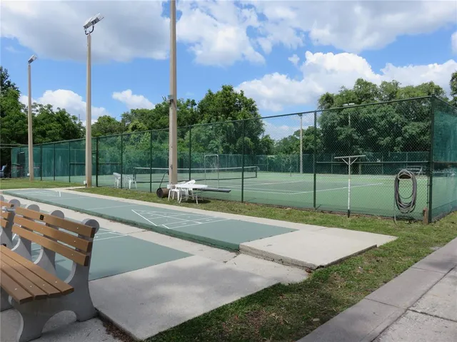 a view of swimming pool with a patio