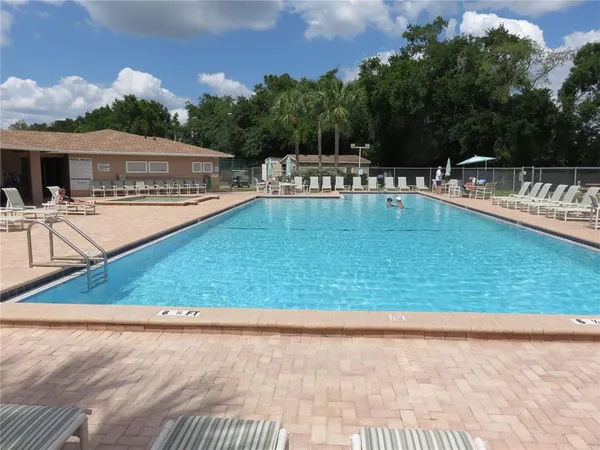 a view of swimming pool with a terrace