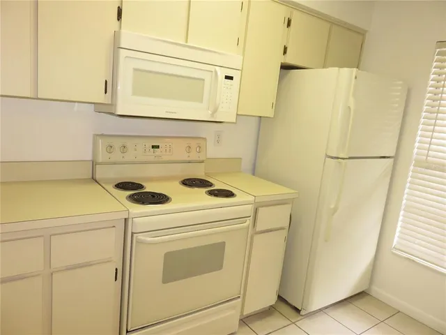 a utility room with a washer and dryer