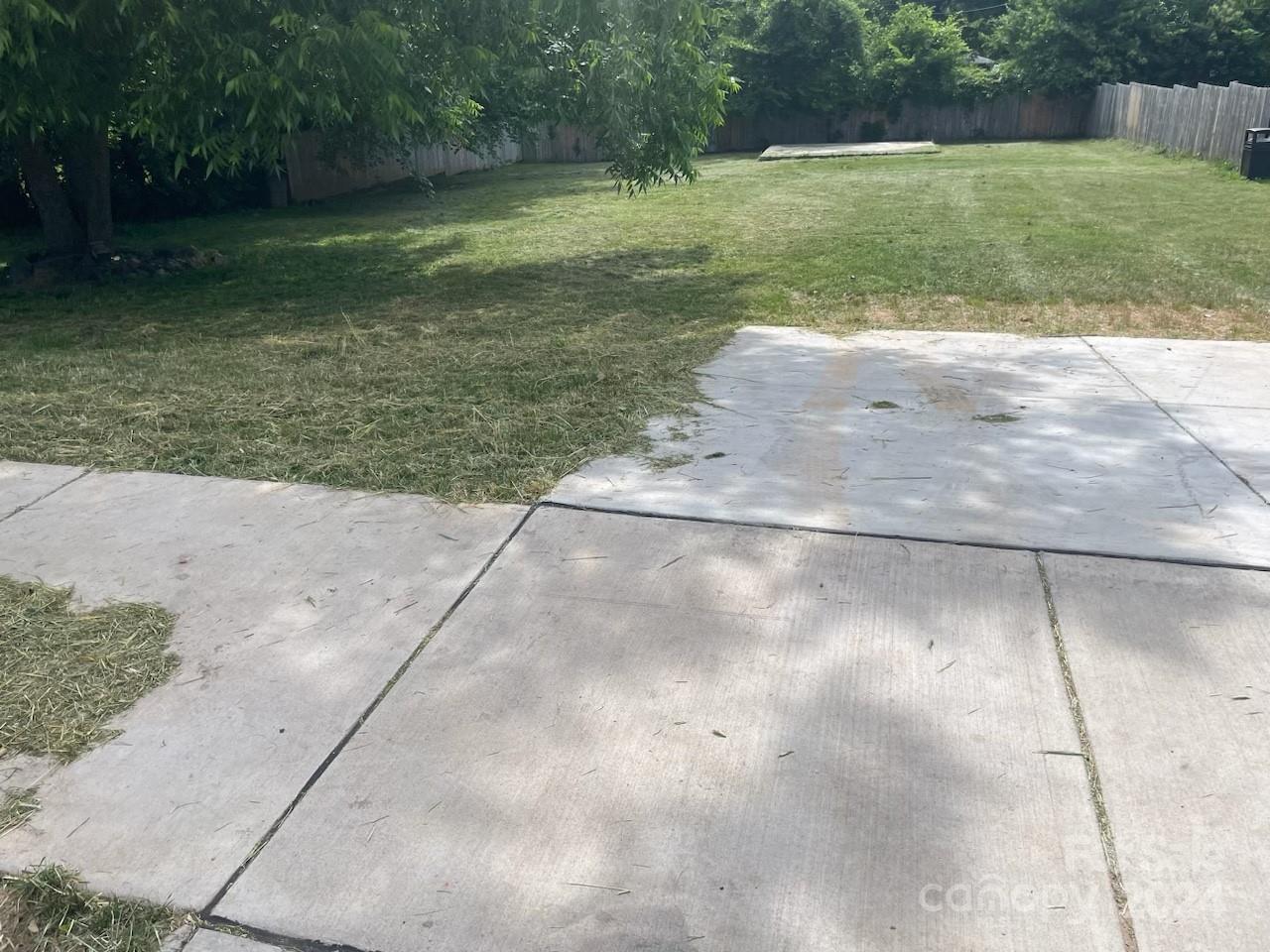 1915 Beatties Ford Road Charlotte, NC 28216 - Photo 2 of 5 a view of a backyard