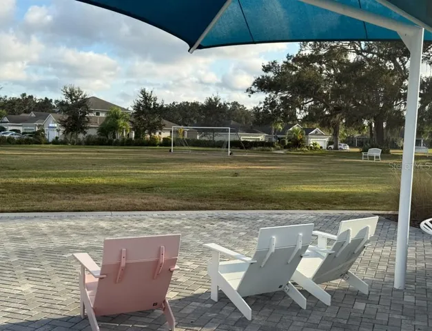 a view of a golf course with a lake