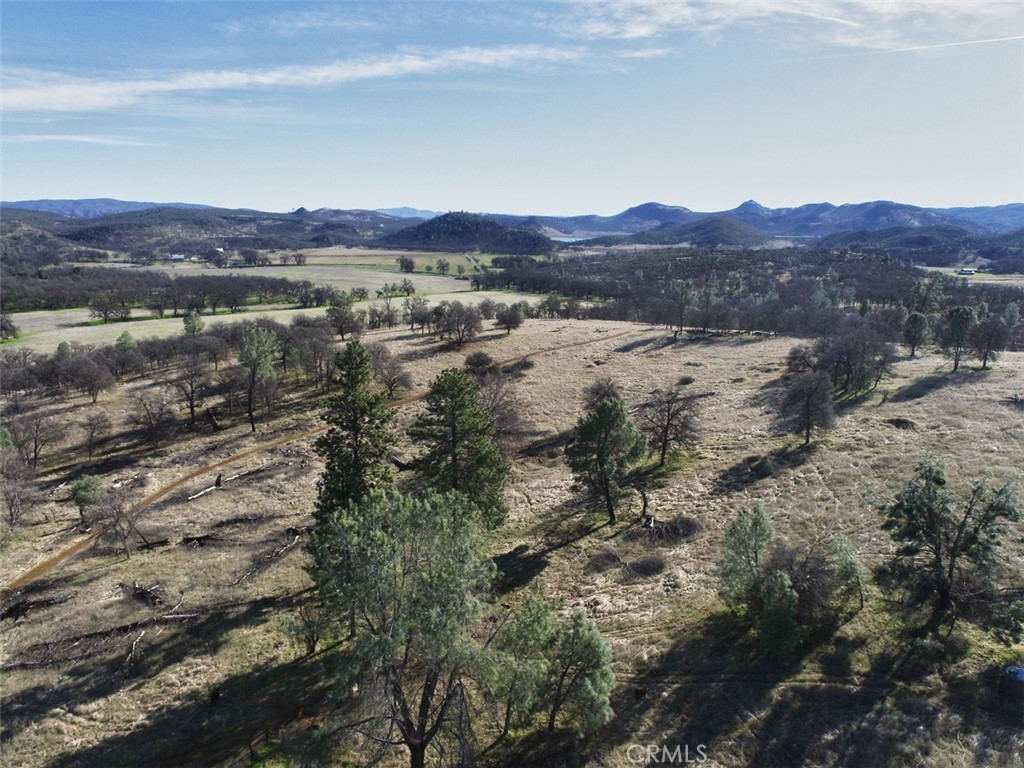 19755 Grange Road Middletown, CA 95461 - Photo 9 of 45 an aerial view of mountain with residential house and green space