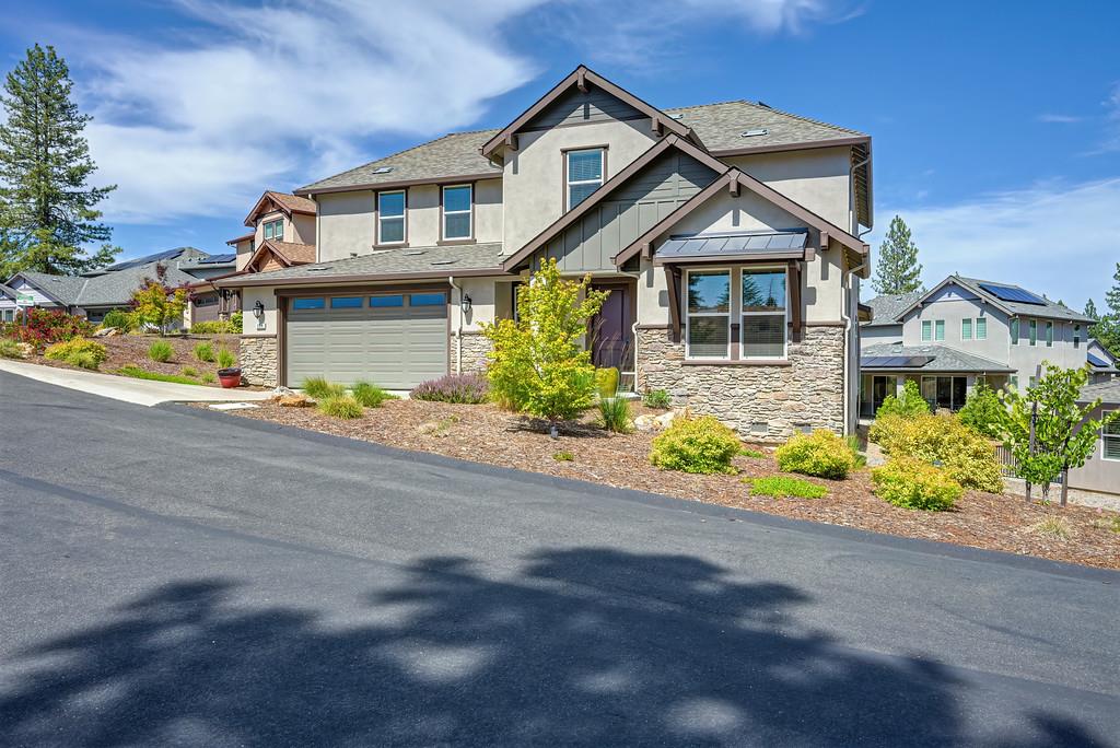 504 Chase Court Colfax, CA 95713 - Photo 13 of 94 a front view of a house with a yard and garage