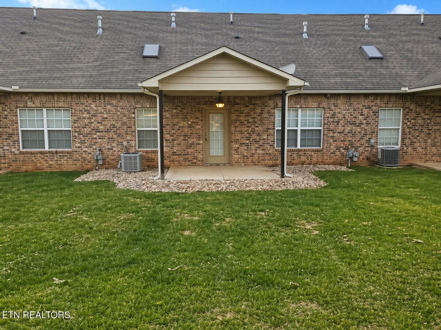 7004 Edon Hall Way Corryton, TN 37721 - Photo 13 of 15 Covered bak Patio