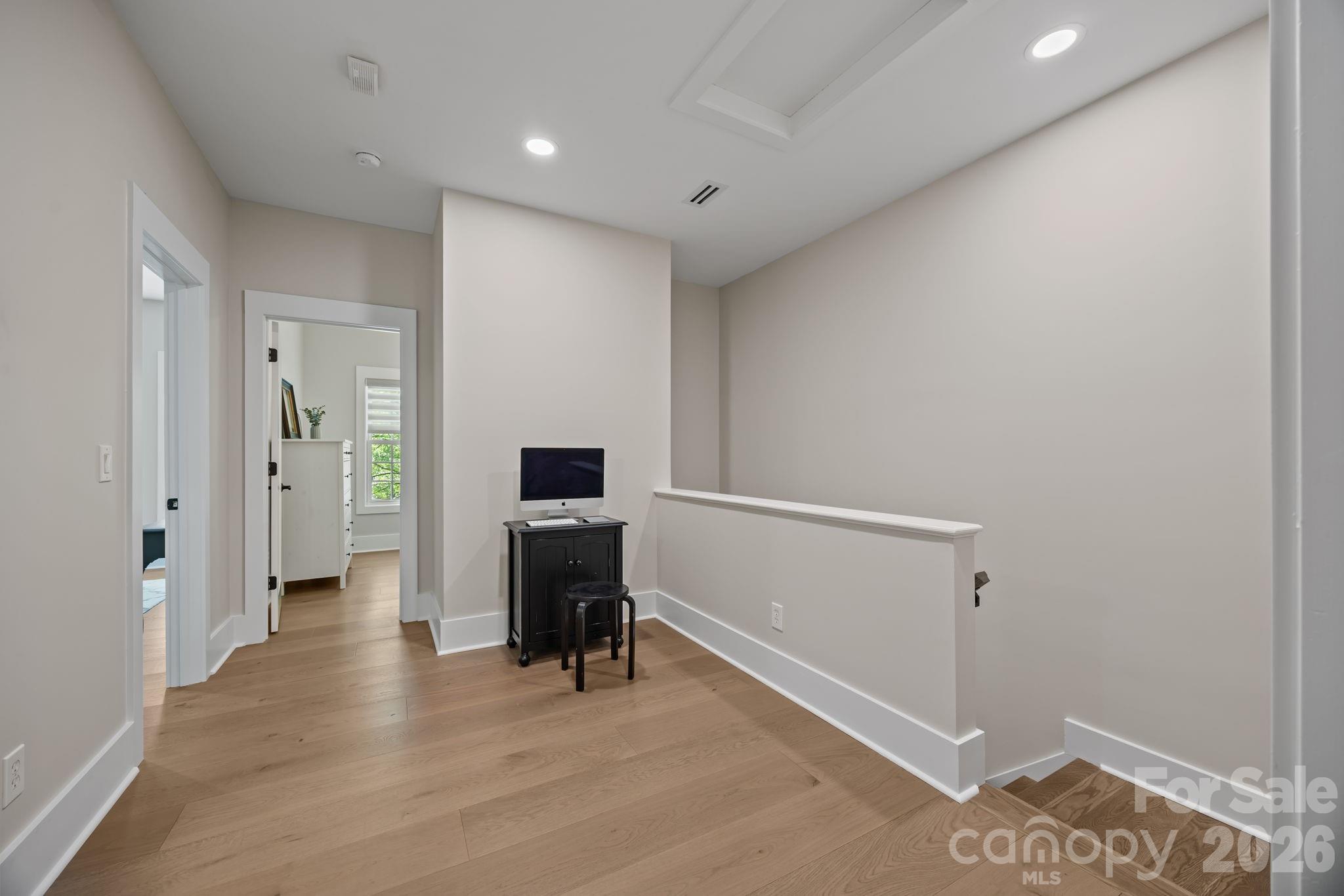 241 North Faulkner Way Davidson, NC 28036 - Photo 30 of 39 a view of a livingroom with entryway and a workspace