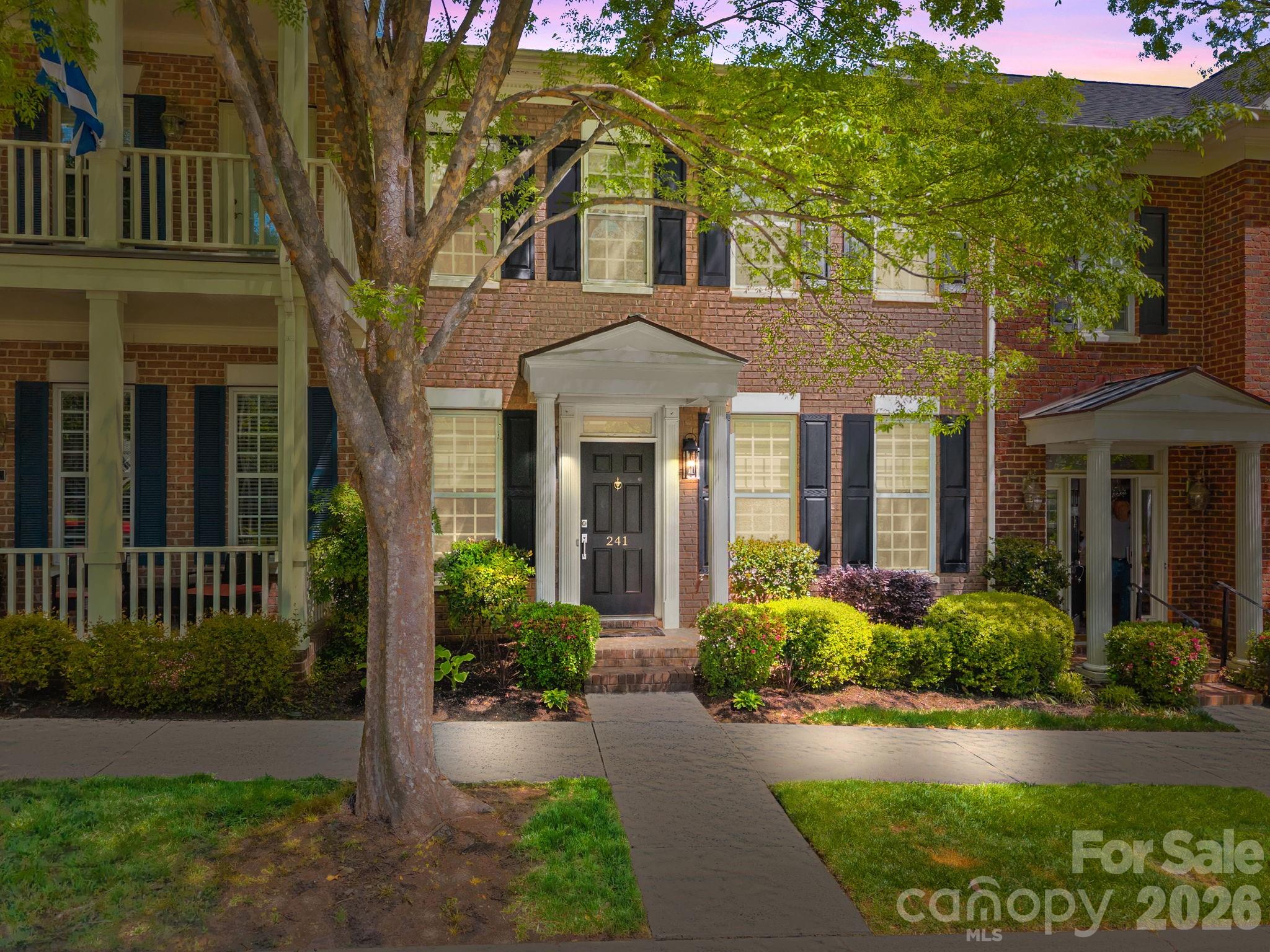 241 North Faulkner Way Davidson, NC 28036 - Photo 38 of 39 front view of a house with a yard