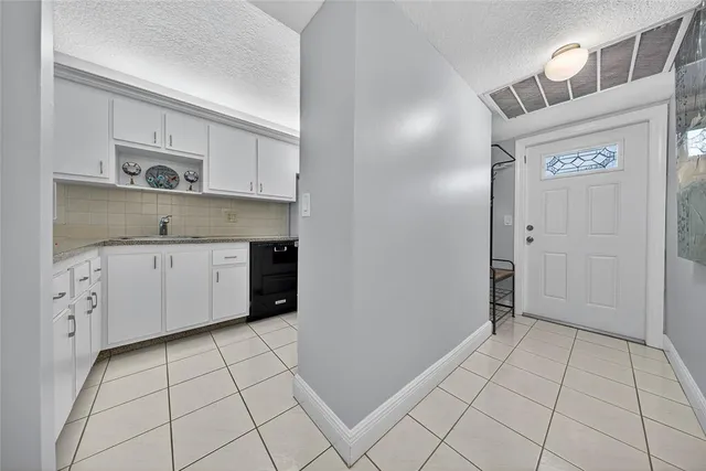 a view of cabinets with wooden floor