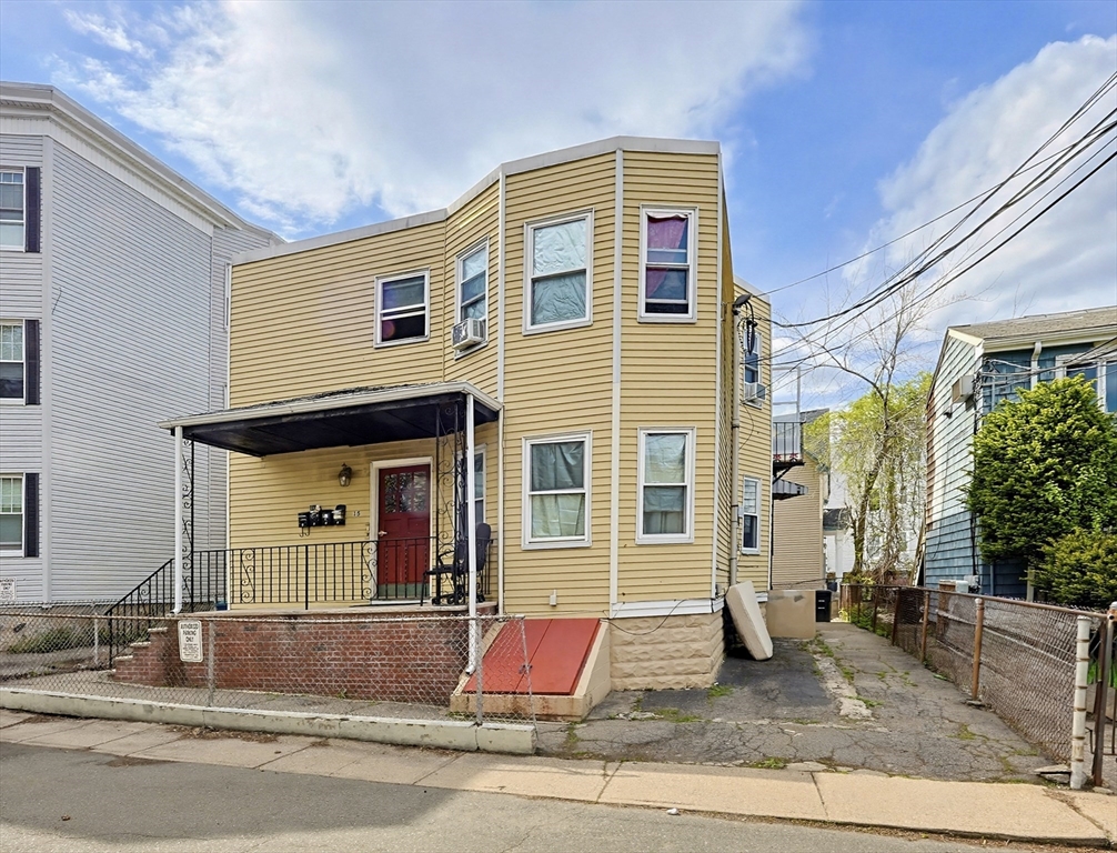 15 Kenneson Road Somerville, MA 02145 - Photo 2 of 18 a front view of a house