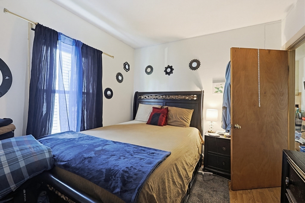 15 Kenneson Road Somerville, MA 02145 - Photo 5 of 18 a bedroom with a bed and a window