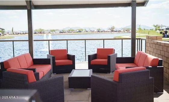 a balcony with furniture and outdoor view