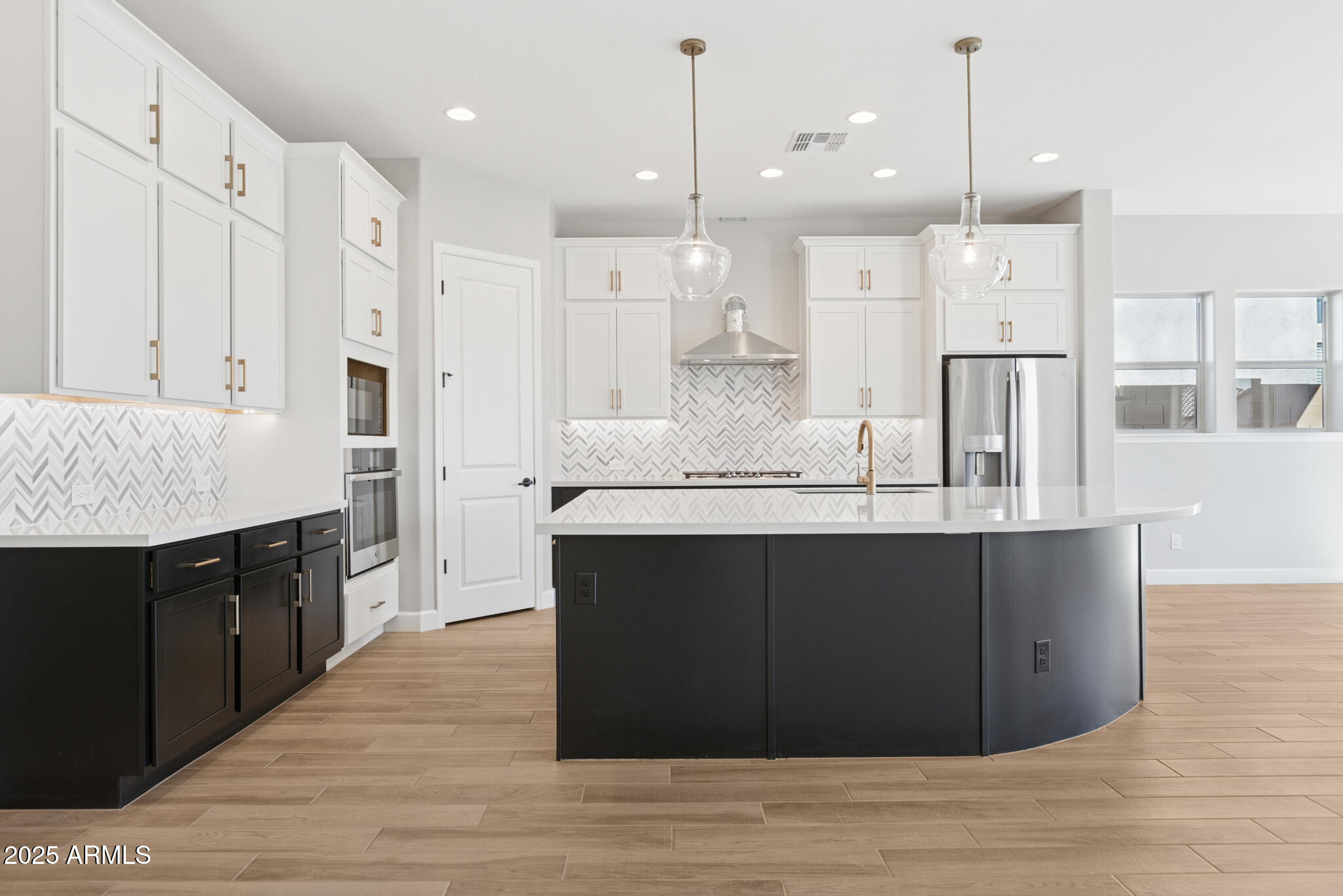 953 Ridge Road Apache Junction, AZ 85120 - Photo 3 of 18 a large kitchen with granite countertop a counter space and stainless steel appliances