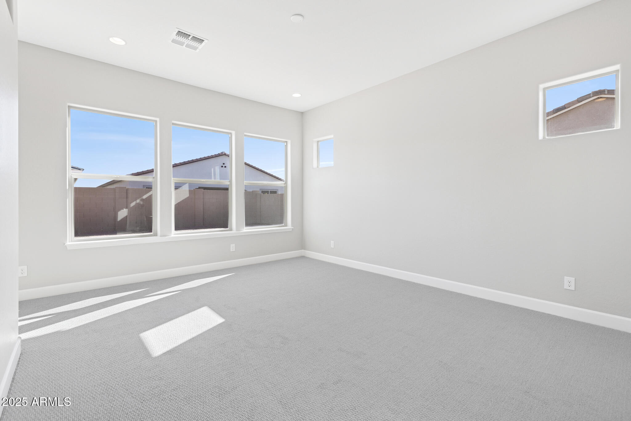 953 Ridge Road Apache Junction, AZ 85120 - Photo 6 of 18 an empty room with a window
