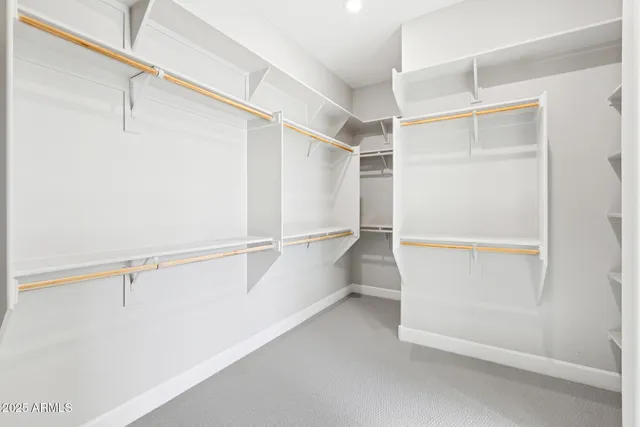 a view of an empty walk in closet
